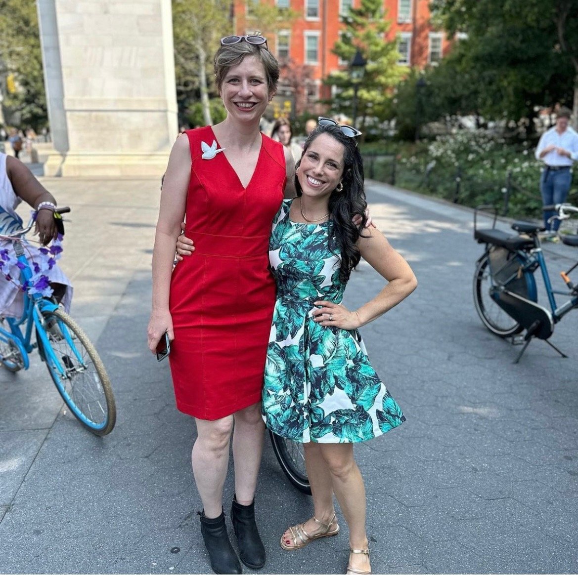 Two women posing for a photo together in Washington Sq. Park.