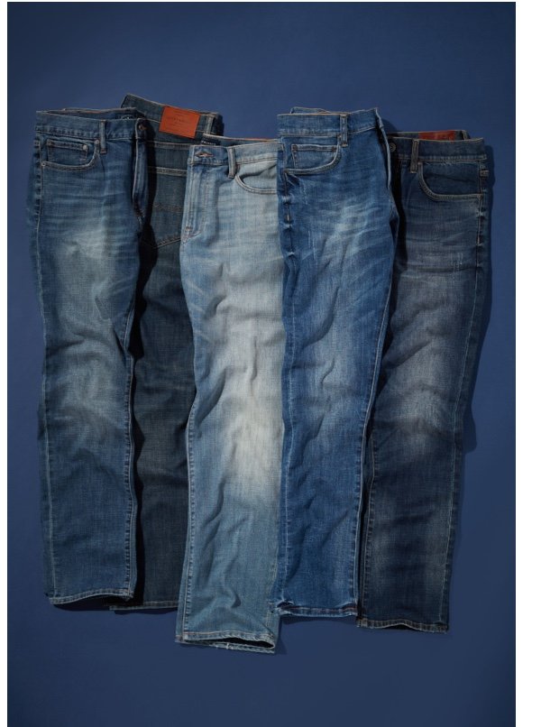 various laydown blue jeans