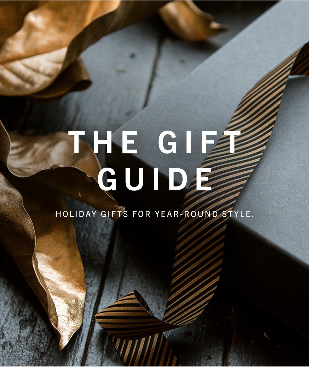 The Gift Guide; holiday gifts for year round style. Set on a photo of a box with signature heirloom ribbon stripe. 